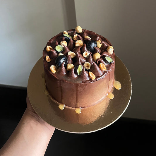 Dark Chocolate, Salted Caramel, Hazelnut Celebration Cake